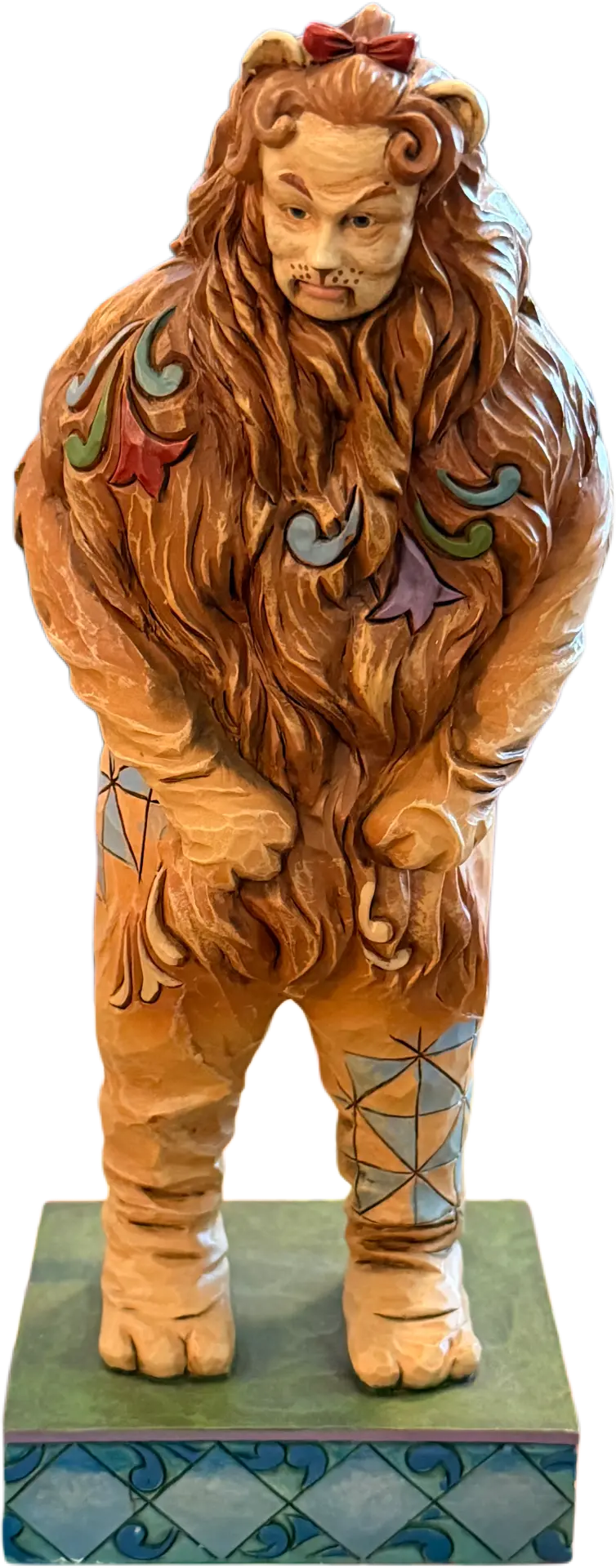 The seller's Jim Shore Cowardly Lion figurine, shown in full